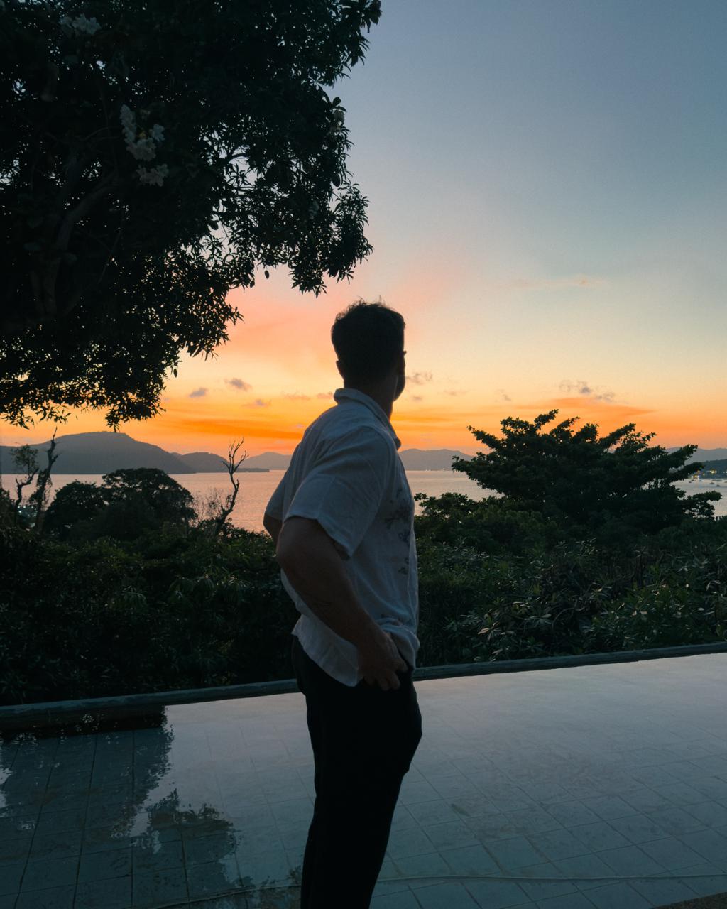 Golden hour rooftop overlooking the ocean